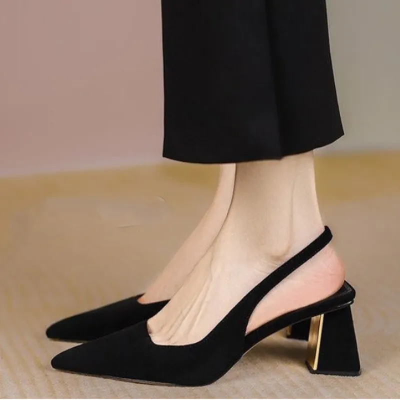 Black shoes with 2025 gold block heel